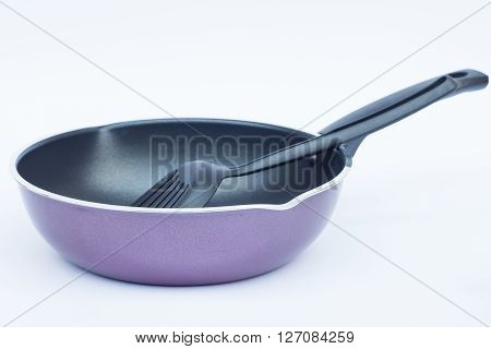 Non stick frying pan on white background, stock photo
** Note: Shallow depth of field