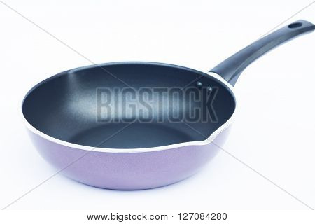 Non stick frying pan on white background, stock photo
** Note: Shallow depth of field