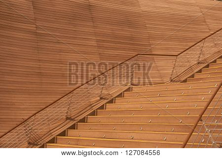 a modern brown color wooden staircase outdoor