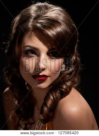 woman studio portrait in hollywood style light on black background