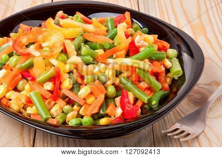 Mexican Mix of Vegetables. Tomatoes, Beans, Celery Root, Green Beans, Peas, Corn. Dietary Food.
