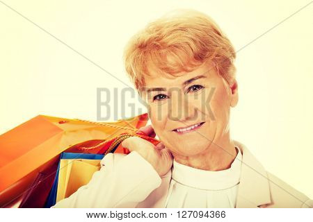 Happy business woman holging shopping bags