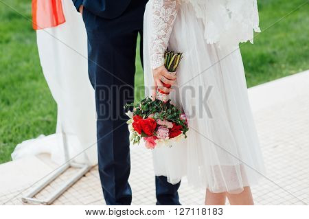 Lovers Hold Hands And Walk In The Park