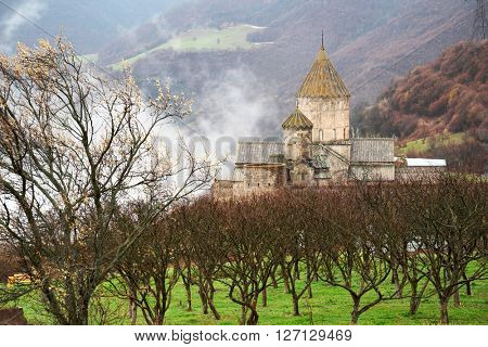 Ancient monastery Tatev covered with clouds in the mountains of Armenia. Was founded in year 906. 