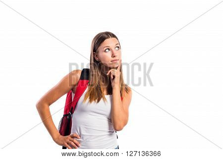 Beautiful student in white singlet with red schoolbag. Studio shot on white background, isolated.
