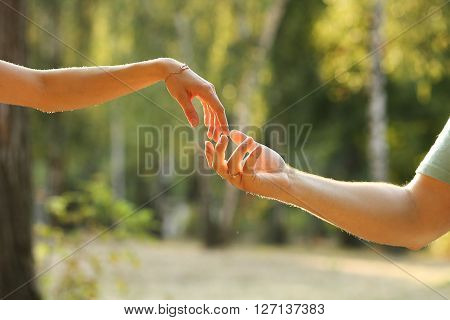 a  kute a two hands loving couples