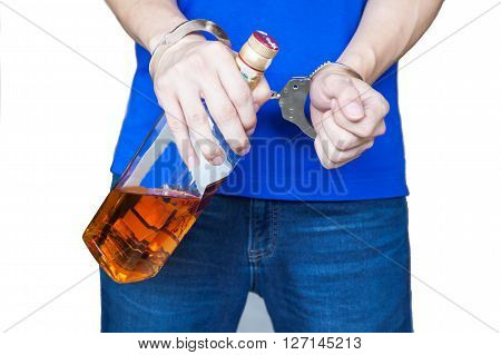 Man Hand Carrying Alcohol Drink With Handcuffs - Drunk Driving, Alcohol Addiction Effect Concept (fo