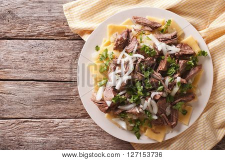 Beshbarmak Dish: Noodles With Lamb And Onion. Horizontal Top View