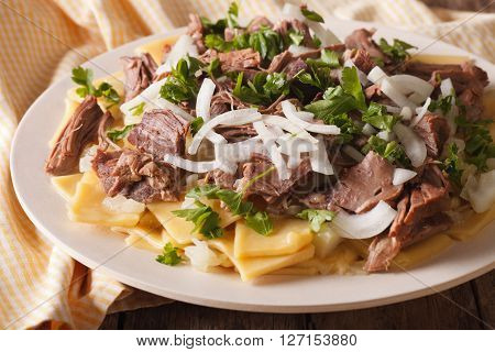 Asian Beshbarmak - Noodles With Mutton And Onion Close-up. Horizontal