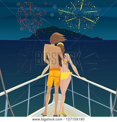 Young man and a beautiful girl standing on the deck at night and admire the fireworks over the island - Celebration or Festival concept