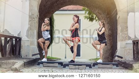 girls stepping on exercising steeper outdoor