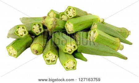 Fresh uncooked okra seed pods isolated on a white background