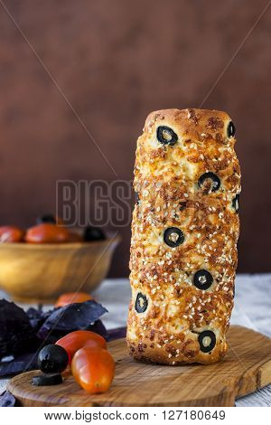 spicy hungarian a round loaf with olives and cheese