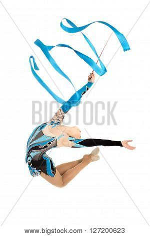 Flexible young gymnast dance with ribbon, sport