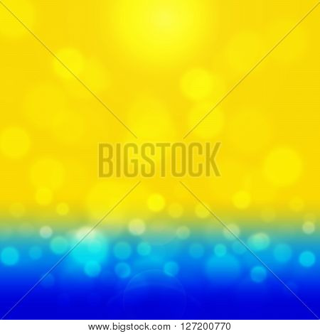 Summer background with yellow bokeh. Sea and sand glisten in the sun