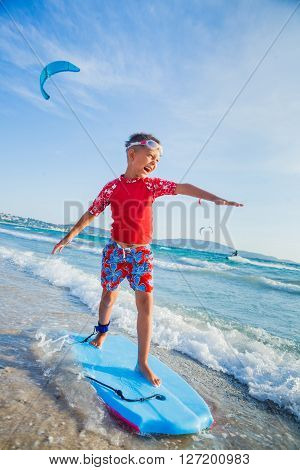 Young little boy learning to surf board
** Note: Visible grain at 100%, best at smaller sizes