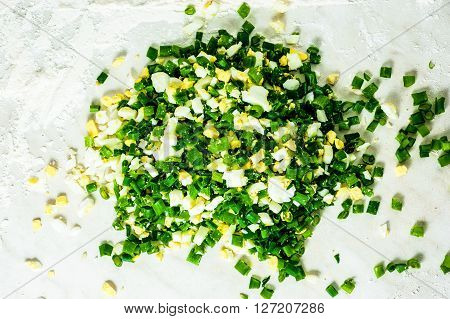 Chopped Onion And Boiled Eggs.