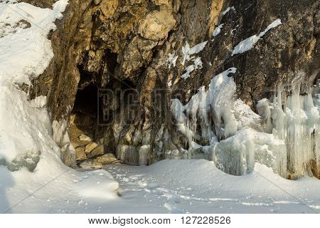 Frost before grotto in the rock. Beautiful winter landscape in the Lake Baikal.