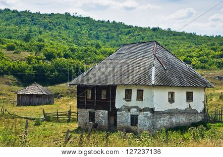 Old style stone and wood house at Pester plateau in southwest Serbia