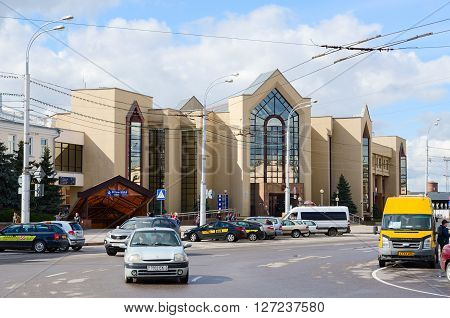 GOMEL BELARUS - APRIL 23 2016: Unidentified people are near building of suburban railway station on Privokzalnaya square Gomel Belarus