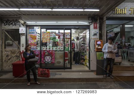 BANGKOK THAILAND - JAN 25 : unidentified people at outside of Seven-Eleven store near National Stadium on january 25 2016