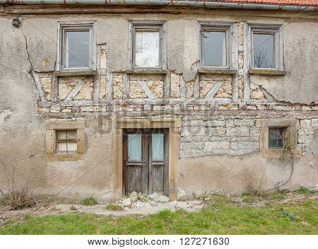 detail of a rundown old farmhouse in Southern Germany