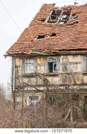 detail of a rundown old farmhouse in Southern Germany