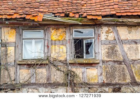 detail of a rundown old farmhouse in Southern Germany