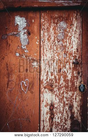 The texture of old door which the old paint flaking. The texture of old door which the old paint flaking
