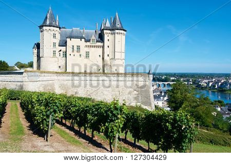 Saumur castle and Loire River, Loire Valley, France. Saumur Castle was built in the tenth century and rebuilt in the late twelfth century.