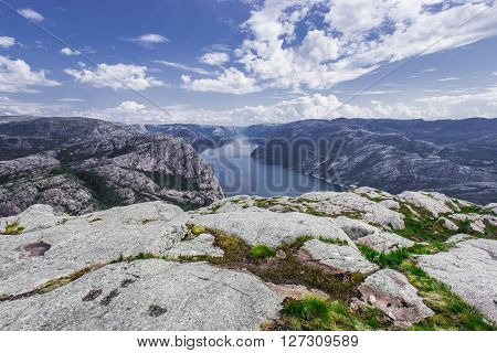 Trekking in Norwegian fjords - view over Lysefjord from a cliff