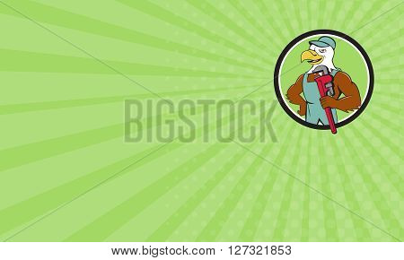 Business card showing illustration of an american bald eagle plumber wearing hat holding monkey wrench looking to the side set inside circle done in cartoon style.
