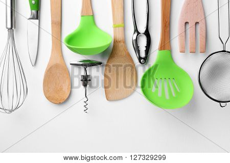 Set of stainless and wooden utensils, isolated on white