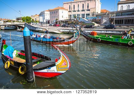 Aveiro Portugal - 22 May 2015: Moliceiro boats sail along the central canal