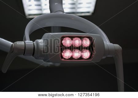 Glowing White Medical Shadowless Lamp With Yellow Pink In The Dark Room