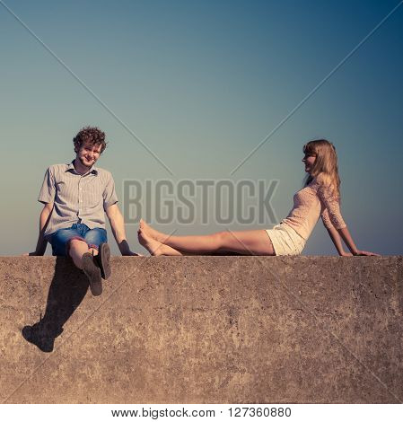 Happiness summer dating concept. Man and woman spending time together having fun outdoor.