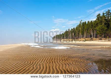Spring landscape with fog on the river. Russia Siberia Novosibirsk region Ob river