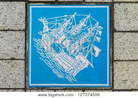 YOKOHAMA JAPAN - NOVEMBER 24 2015: Signs along footpath on the side of streets in Yokohama Chinatown