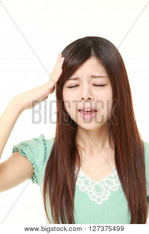 studio shot of perplexed woman on white background