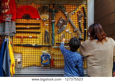 YOKOHAMA JAPAN - NOVEMBER 24 2015: Yokohama Chinatown is Japan's largest chinatown. A large number of Chinese stores and restaurants can be found in the narrow and colorful streets