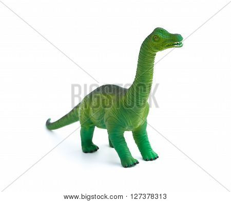 green brachiosaurus toy on a white background