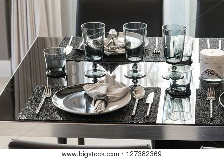 Served With A Plate On  Black Table In Modern  Dinning Room