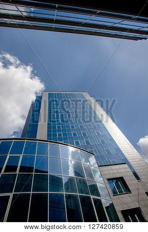 high-rise office buildings against a blue sky