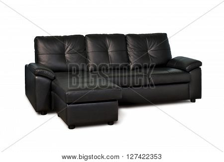 Bllack leather sofa with stool isolated on white background
