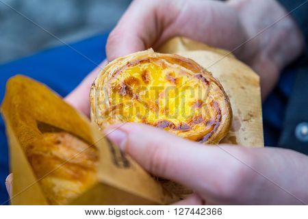 Pastel De Nata in Mans Hand, Portuguese Dessert