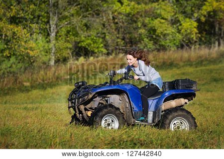 Elegant Woman Riding Extreme Quadrocycle Atv