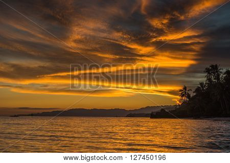 Sunset view at the Anda White Long Beach at Bohol island of Philippines