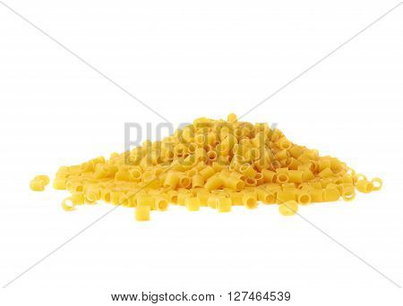 Pile of dry ditalini yellow pasta over isolated white background
