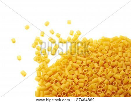Pile of dry ditalini yellow pasta over isolated white background