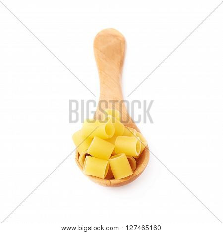 Wooden spoon filled with dry ditalini yellow pasta over isolated white background